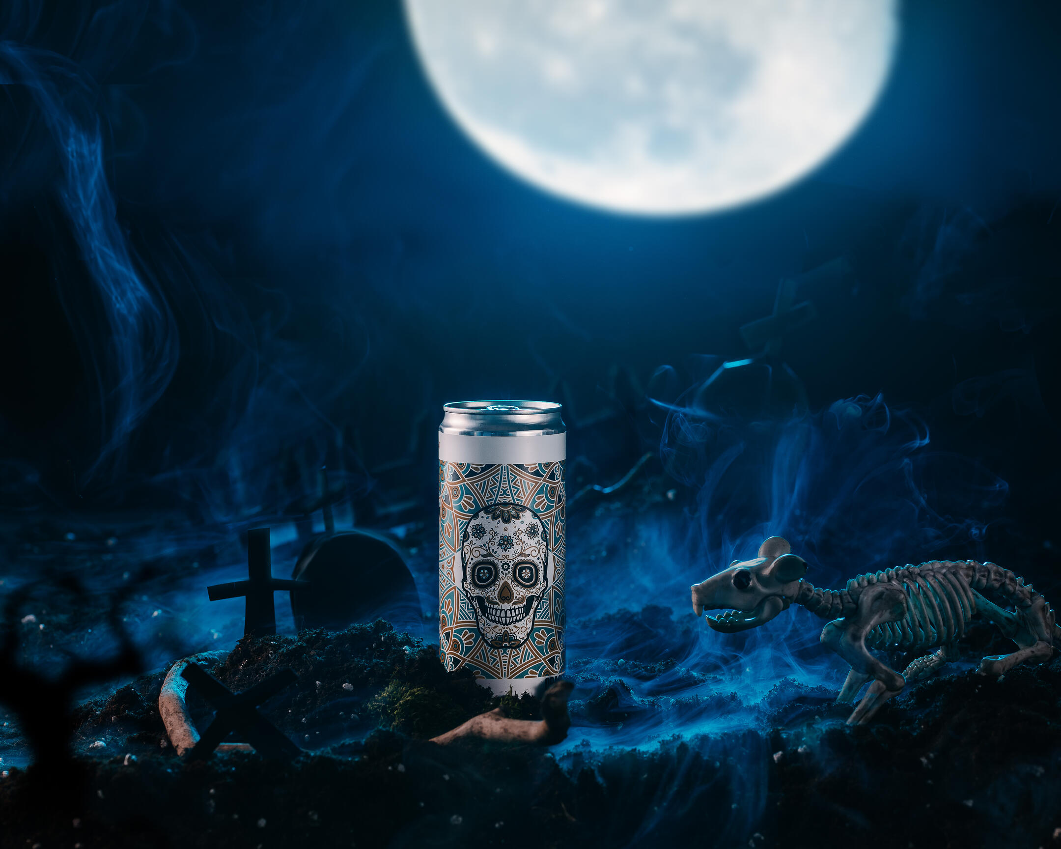  A Beer Bastard stands in the foreground in the light of the moon.  Landscape shot. A bottle of beer. Bastard stands in the foreground in the light of the moon. Judging by the ground around the bottle and the fog, events unfold in the cemetery at night. This conjecture is confirmed by the outlines of the graves in the background. The light of the moon illuminates the skeleton of a rat on the right - which is sneaking toward the bottle. Halloween ad shot