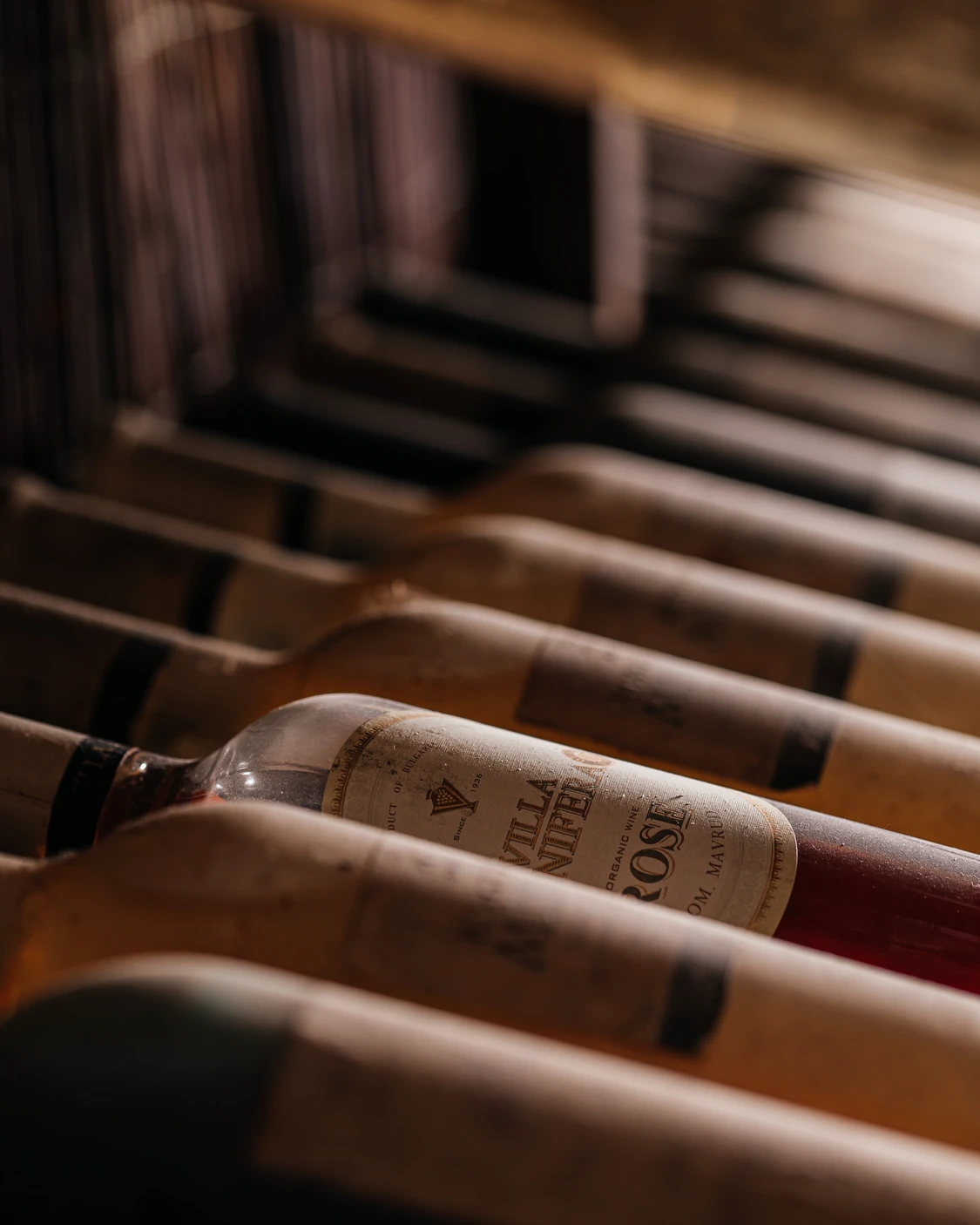 Bottles of wine - Vila Vinifera. Bottles of wine with Villa Vinifera - Rose in focus.