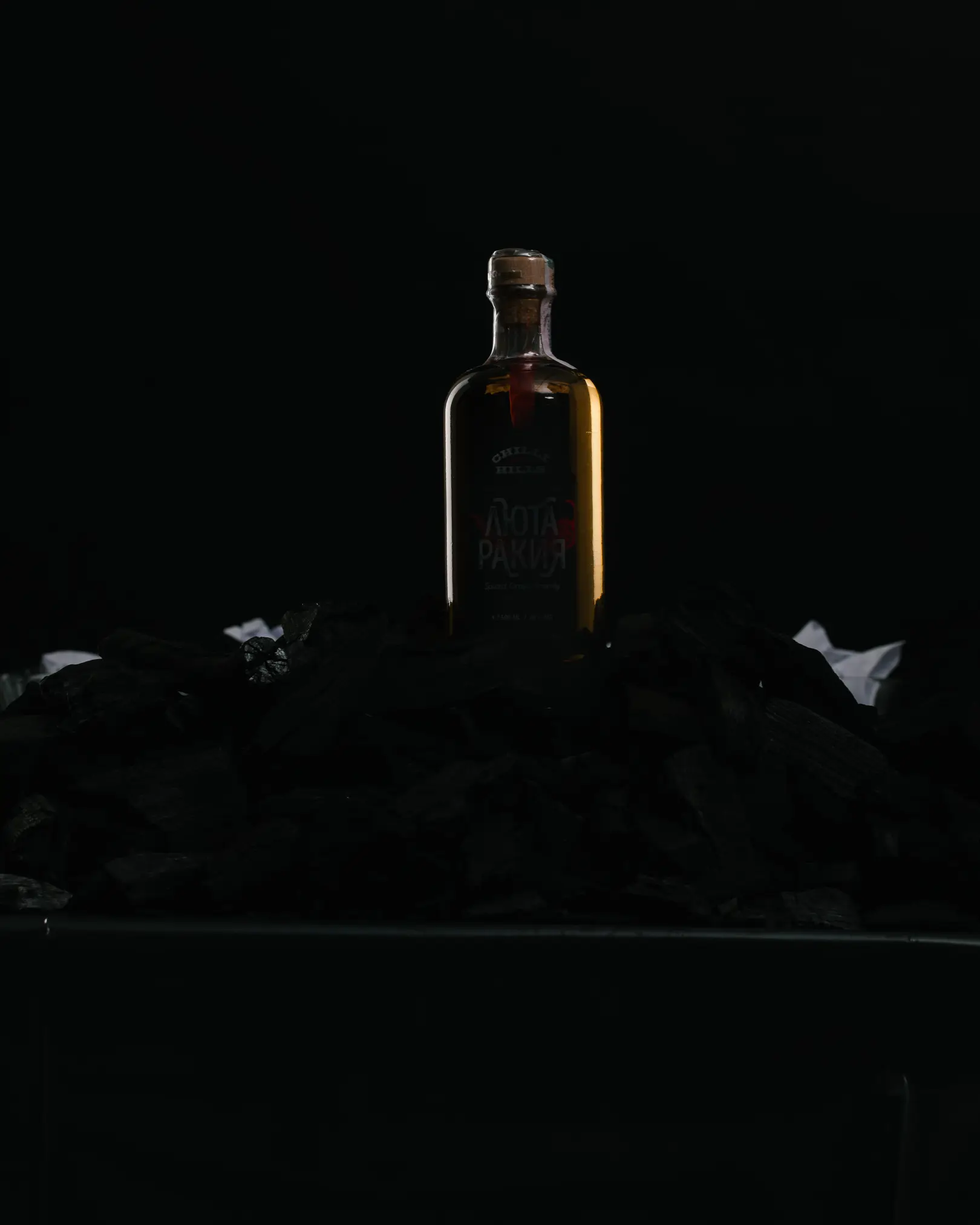 Result 1. The photo shows the result of shooting a bottle according to the light scheme shown in the first schema. The viewer sees the outline of the bottle.