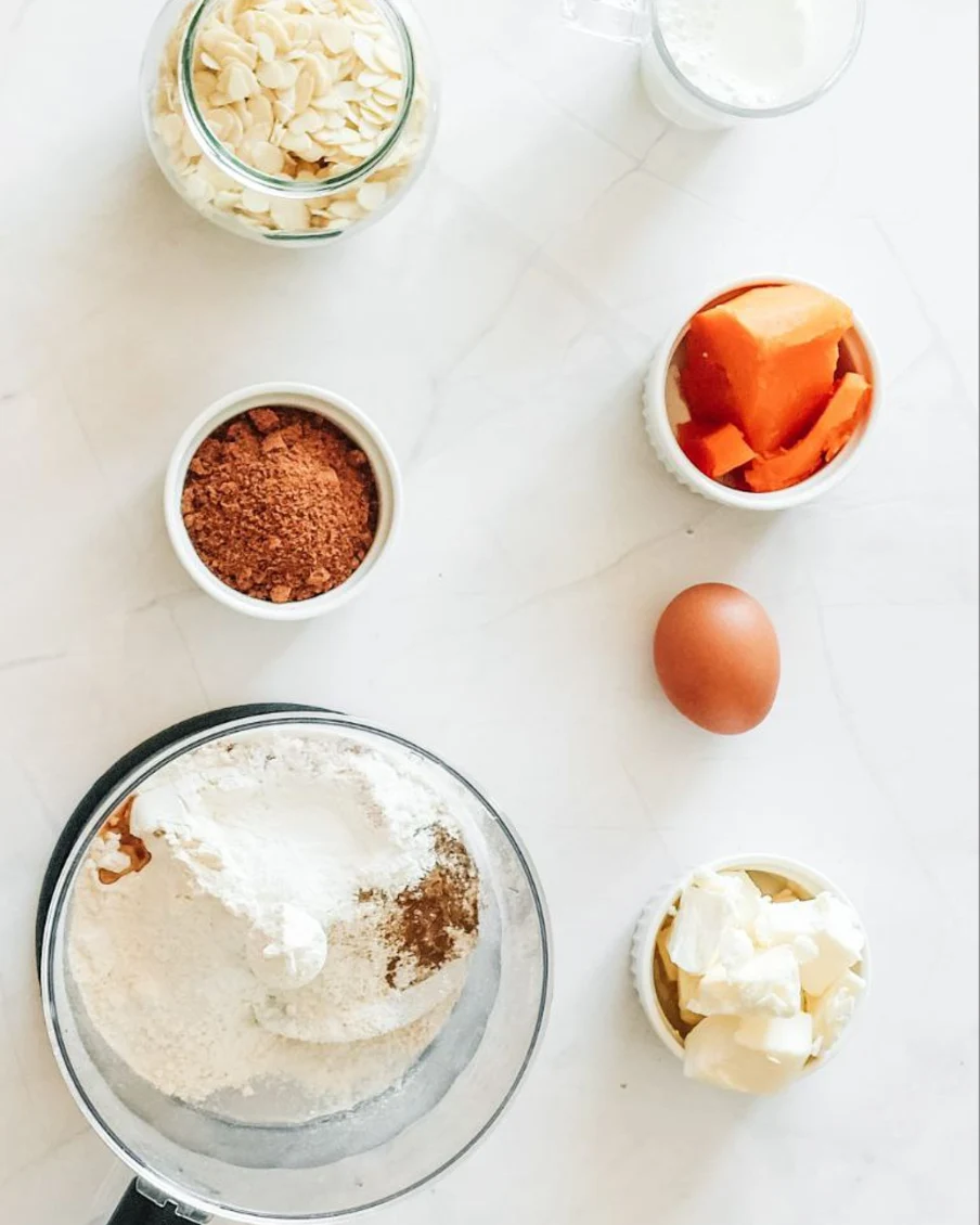 Ingredients for scones. Ingredients for scones are on the table in small bowls. Flour, butter, sugar, egg, baked pumpkin.