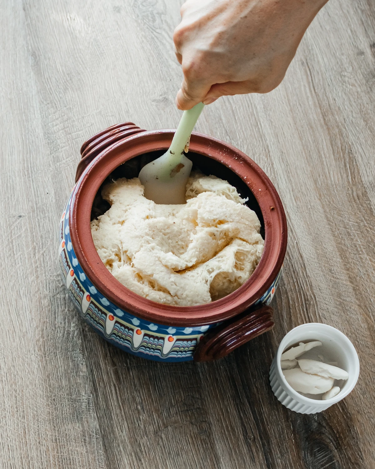 Adding potatoes - mixing. 