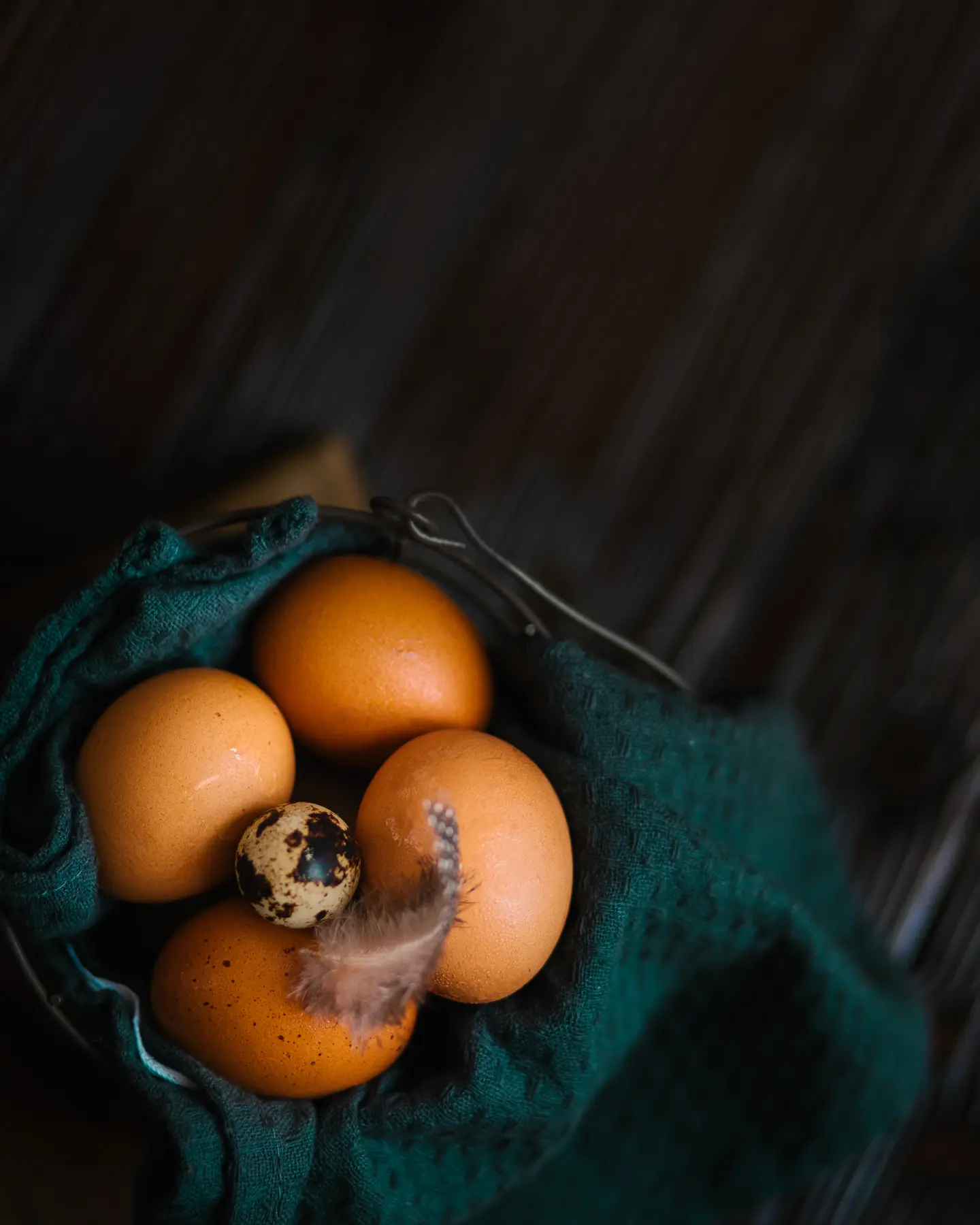 The eggs are in a basket. The eggs are in a basket.