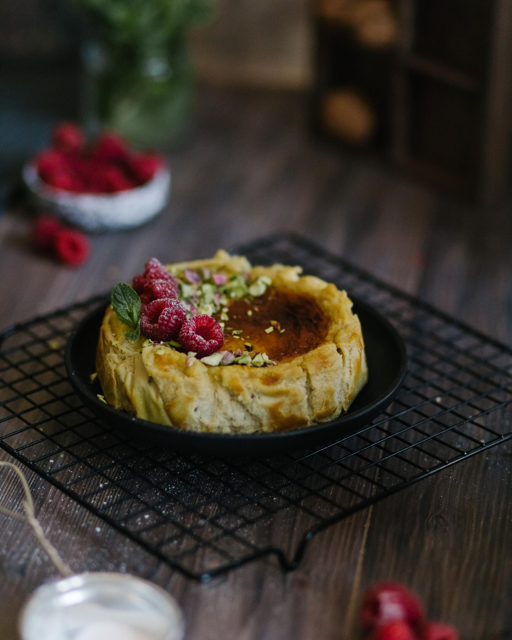 Basque cheesecake. There is a Basque cheesecake on a pastry rack to cool.