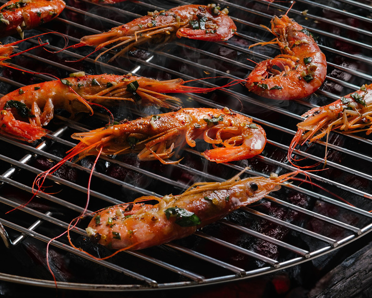 Shrimps. Shrimps. Shrimps on a BBQ grill.